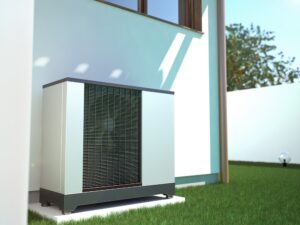 An air source heat pump outside a white house