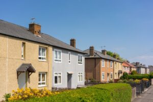 A street of semi-detached homes in the Pilton area of Edinburgh, Scotland.