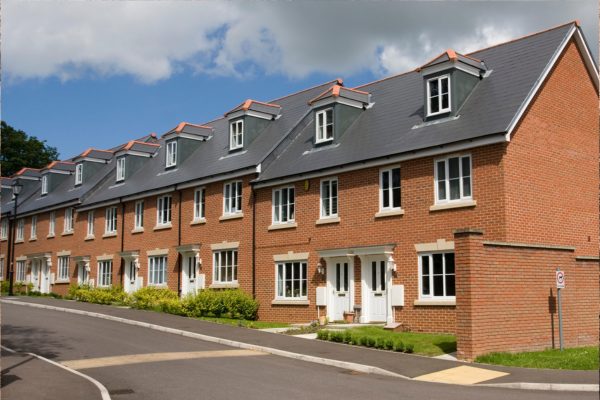 Row of terraced houses, each with room in roof